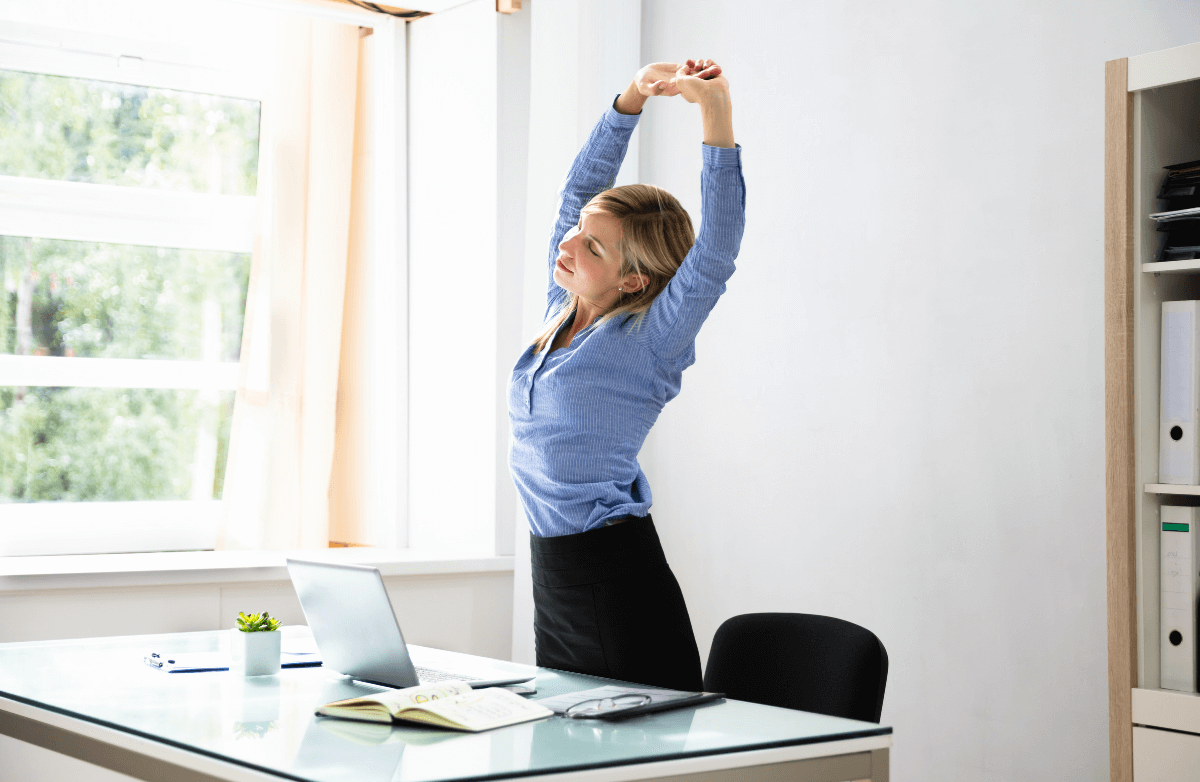 Midday wellness break and stretch routine at work